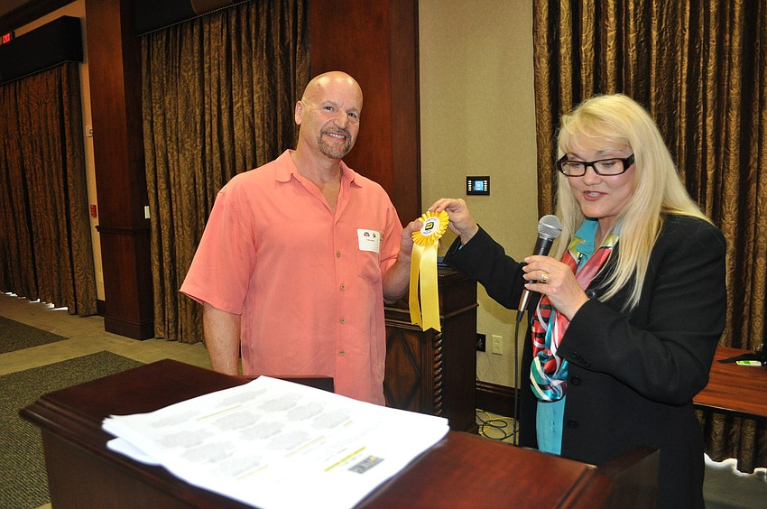 Sarasota resident Fred Levine, a producer of childrenâ€™s shows, accepted his third prizewinner for the scripted â€œGrease Monkeys.