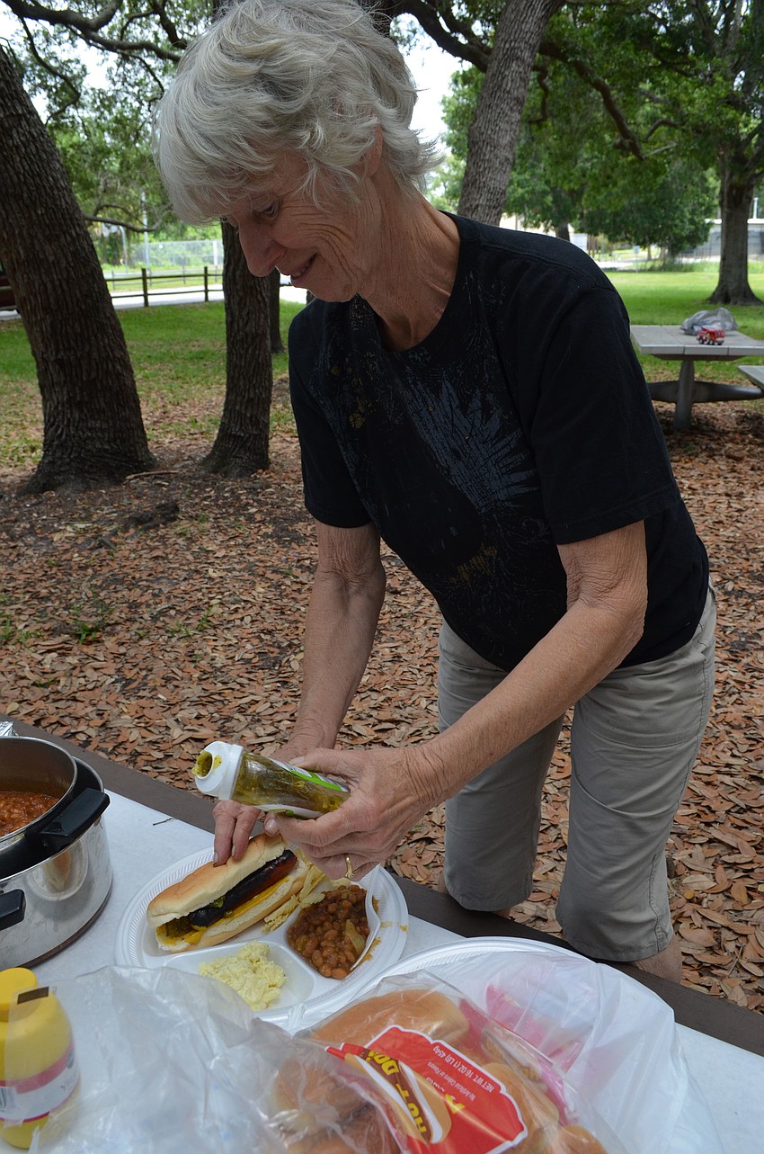 Mary Young gets a hotdog.