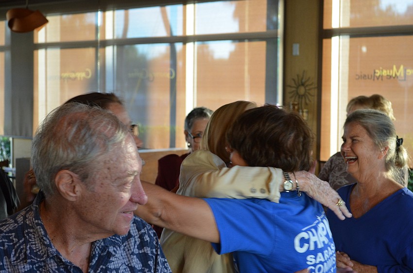 Susan Chapman is congratulated by supporters at Word of Mouth.