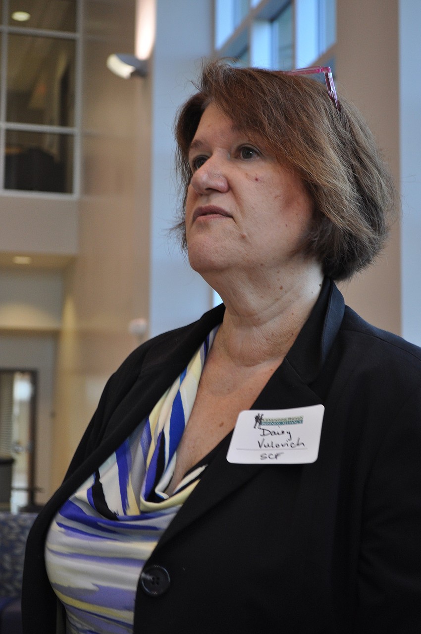 SCF's Daisy Vulovich shares with Alliance members about the collegeâ€™s programming, before leading them on a tour of the Medical Technology and Simulation Center.