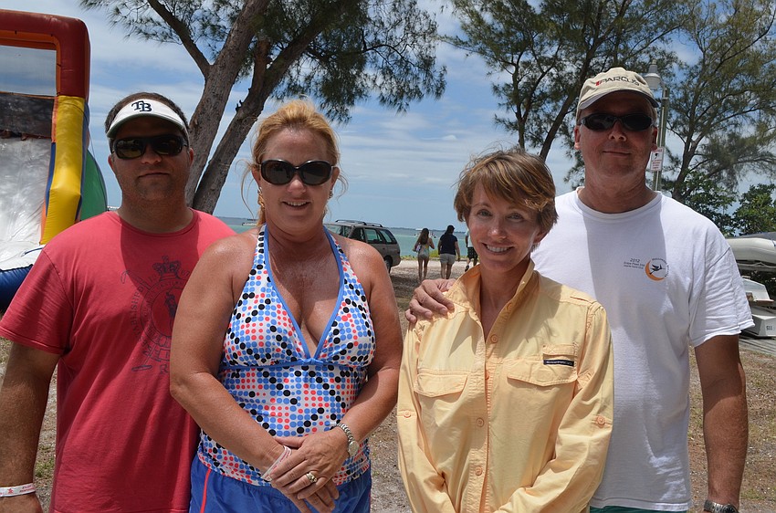 Justin and Martha King and Jesse and Mark Brunsvold brought their children to the race. All of their children sail boats at the Sarasota Sailing Squadron.