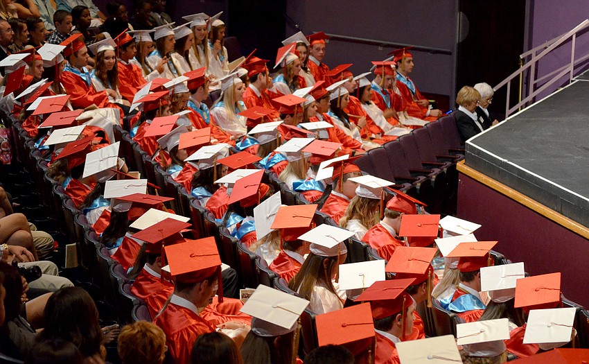 Students listen to the commencement speech.