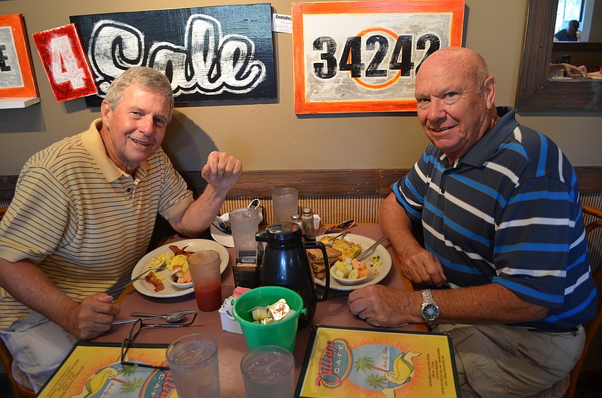 Bay Isle residents Paul Balliette and Malcolm Scott enjoy breakfast at Village CafÃ© before the Adopt-a-Road Pickup. Balliette moved to Siesta Key from Twinsburg, OH 20 years ago. Scott is originally from Toronto but has been in Florida for 37 years.