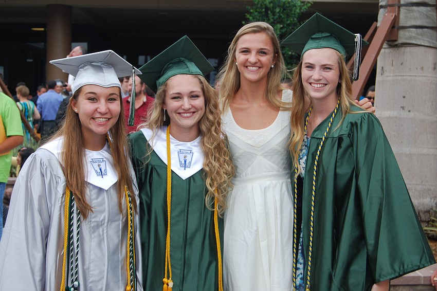 Graduates Emily Lacina, Maddy Keslar and Emily Edwards, right, are pictured with friend, Shannon McCarthy, in white.