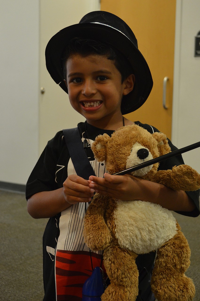 Diego Orjuela is ready for the magic show. He even brought his top hat and magic wand.