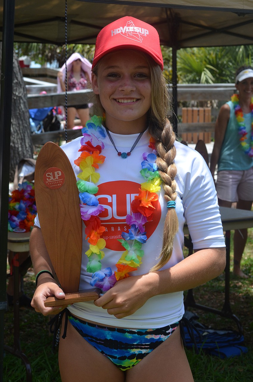 Taylor Jalving received first place with her 14-foot board in the junior girlâ€™s open race.