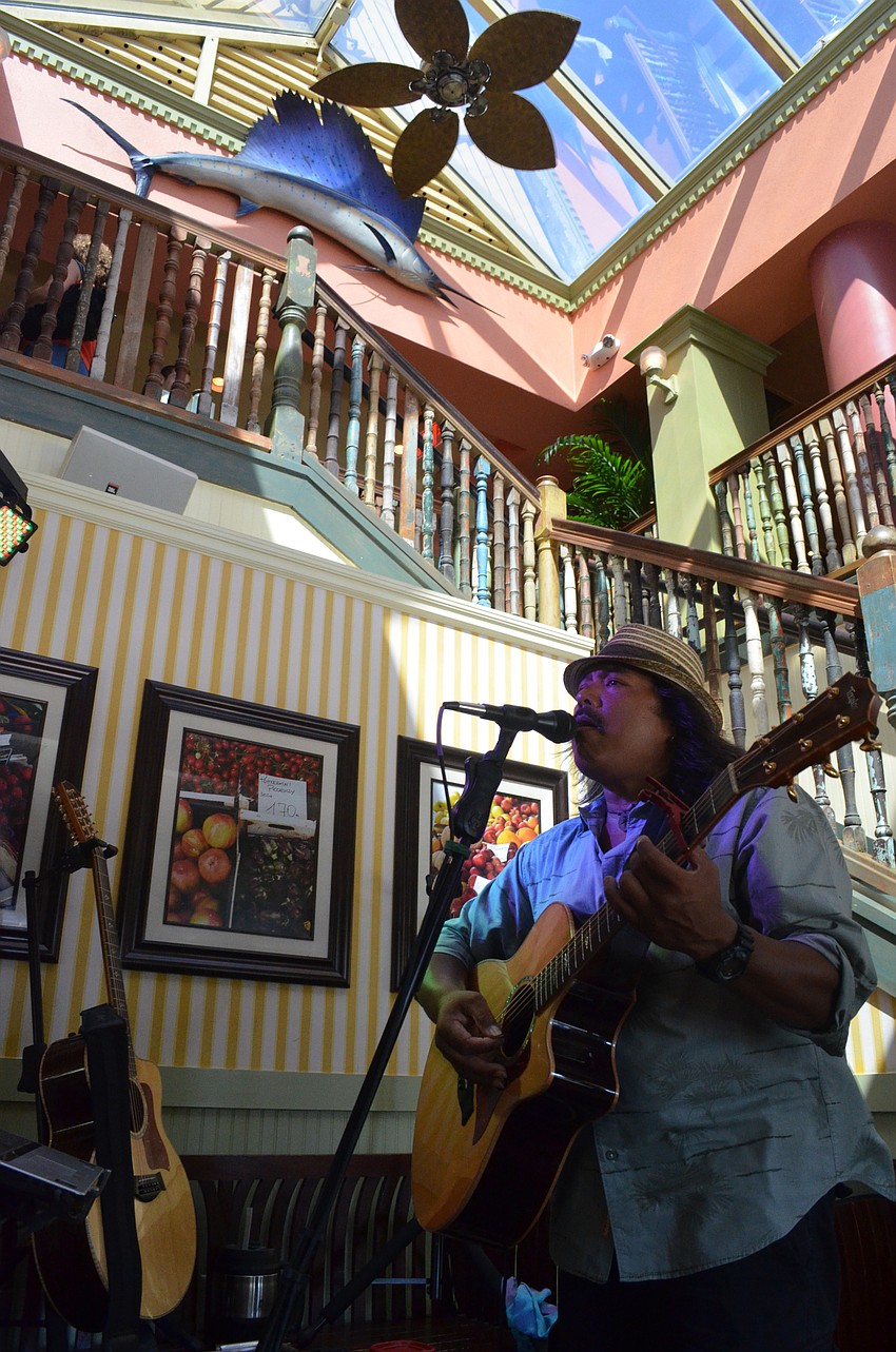 Marcel Alamanzar played mellow island jams for customers at the restaurant. Alamanzar plays at Tommy Bahama on Thursdays, Fridays and Saturdays.