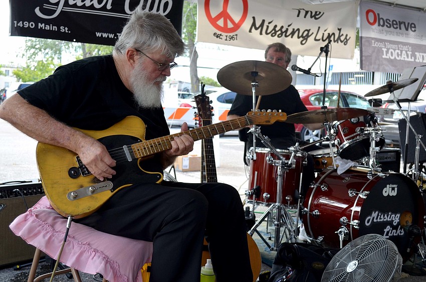 John Purcell plays with the Missing Links Band.