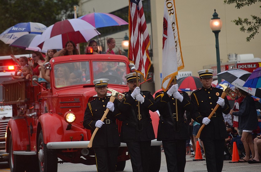 Firefighters march in the parade.