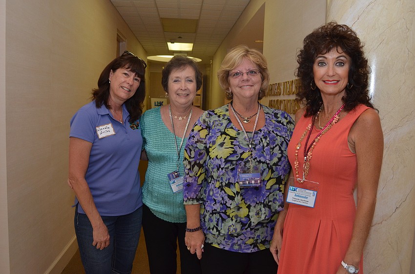 Wanda Smith of Gorilla Kleen, Mary Gamrot of Pampered Movers, Pat Martin of Pampered Movers and Victoria Jacobson of the Longboat Key Chamber of Commerce