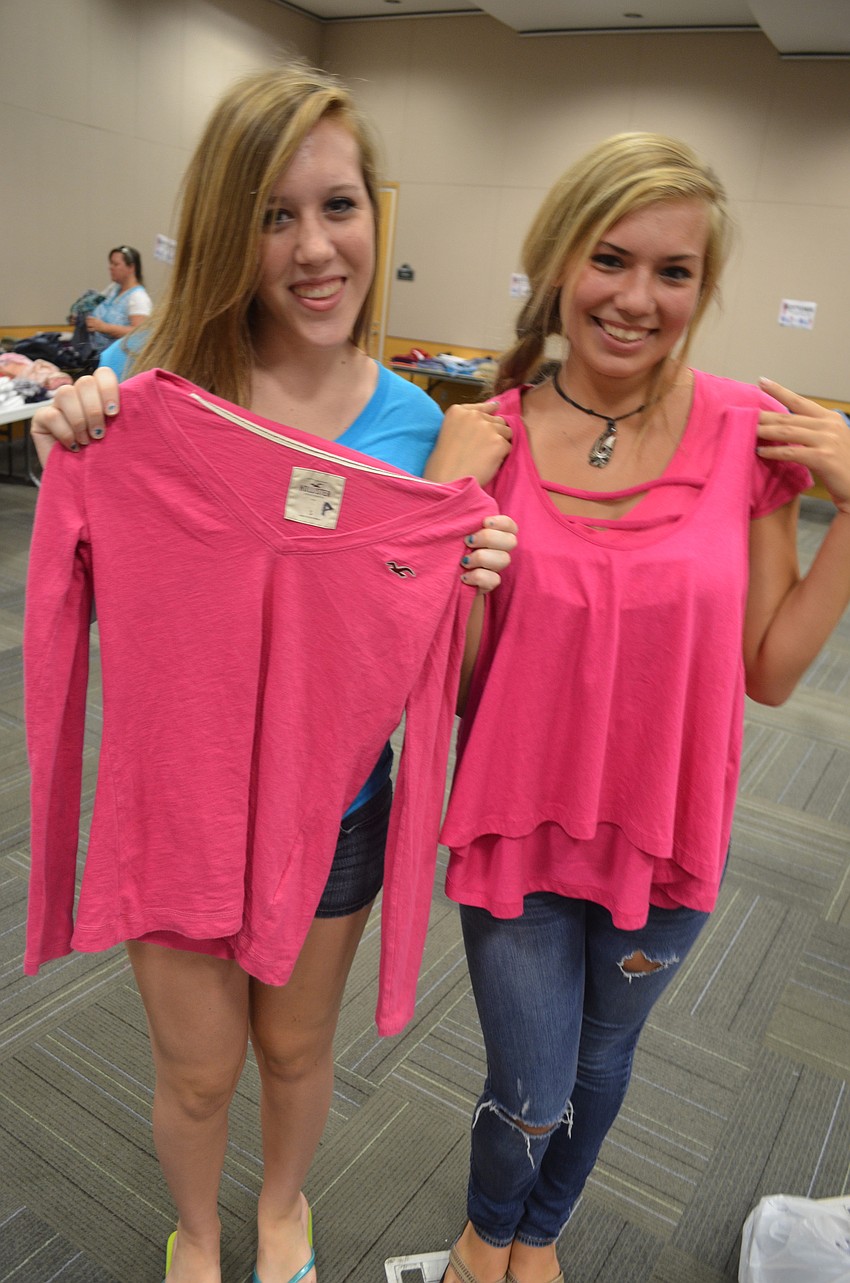 Sam Shaw and Mikayla Cordes swapped clothing for some pink tops.