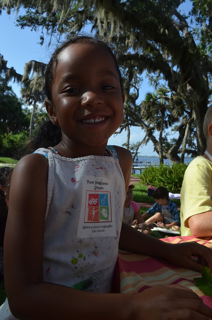 Thalia Nieto, 6, gets ready to work on her project.