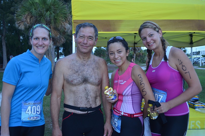Hayley Suratt, Paul Citrin, Ledis Contreras and Priscilla Ostovich make their way to the duathlon starting line.