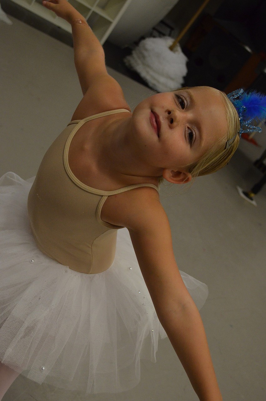 Sienna Steiner, 6, gracefully shows what she has learned.