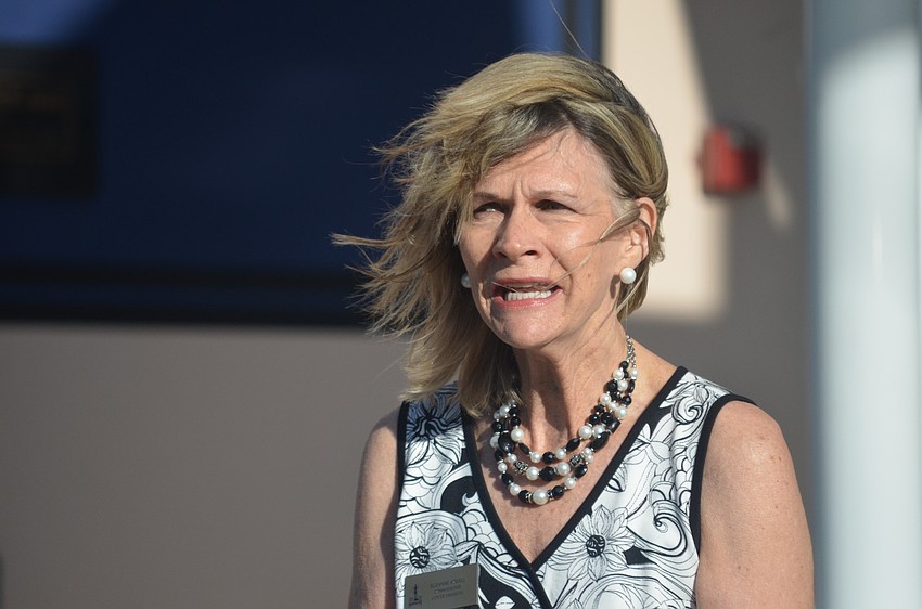 Commissioner Suzanne Atwell speaks during the ceremony.