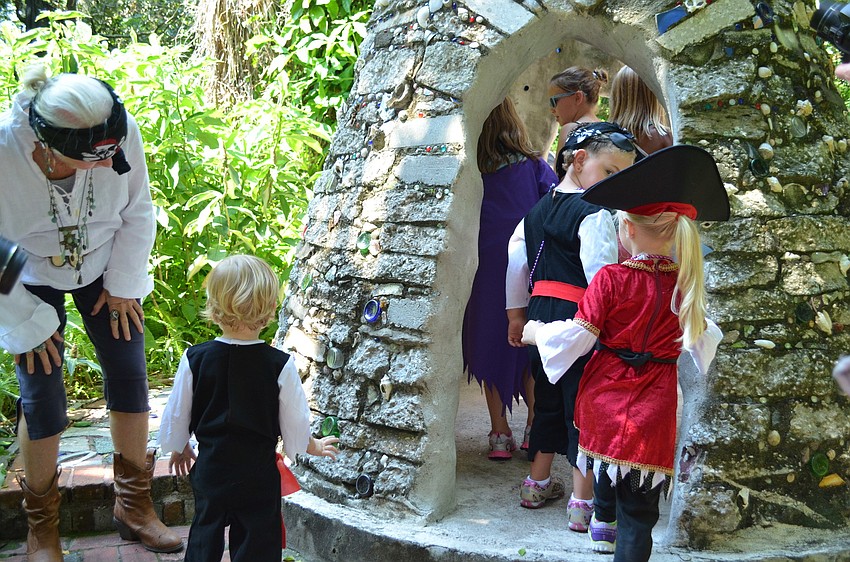 Children at the Childrenâ€™s Garden embark on a treasure hunt.