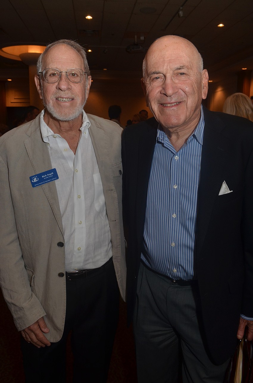 Outgoing board chair Rich Segall and incoming board chair Joe Mendels
