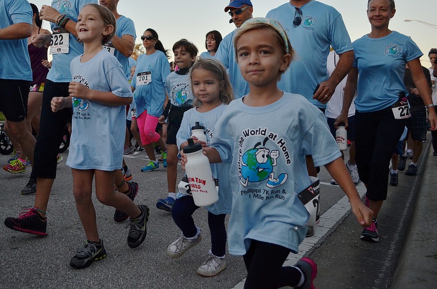 The 1 mile Fun Run racers get off to a fast start.