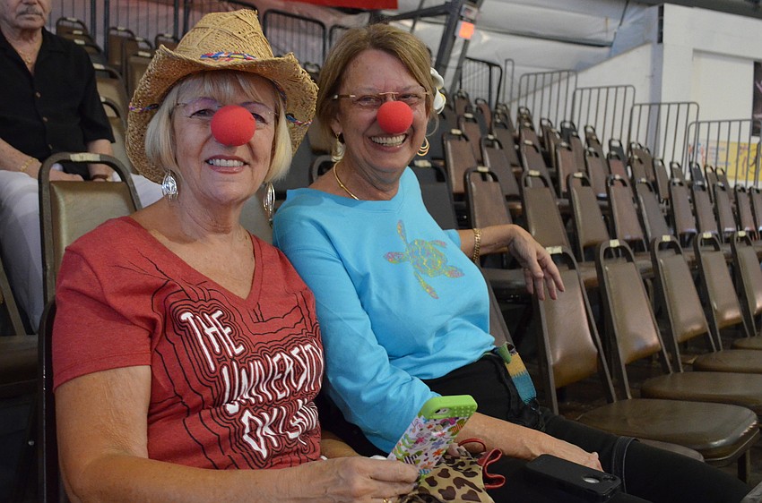 Evelyn Scovill and Marilyn Banks are fans trying to blend in.