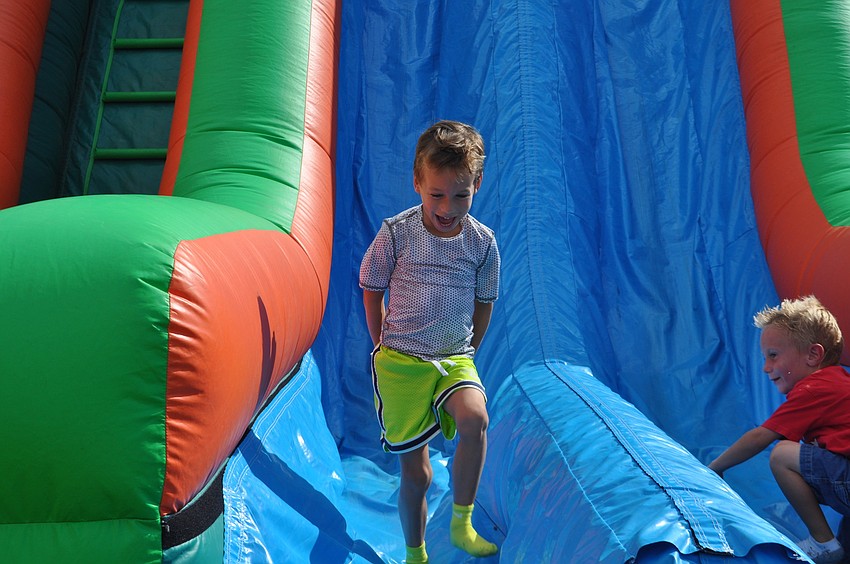 Leo Vachalek slides down the jumbo slide