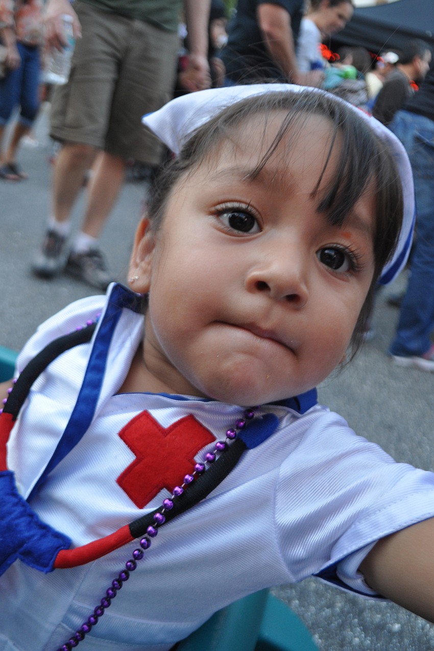 Caroline Aguilera, 2, rode around in a wagon.