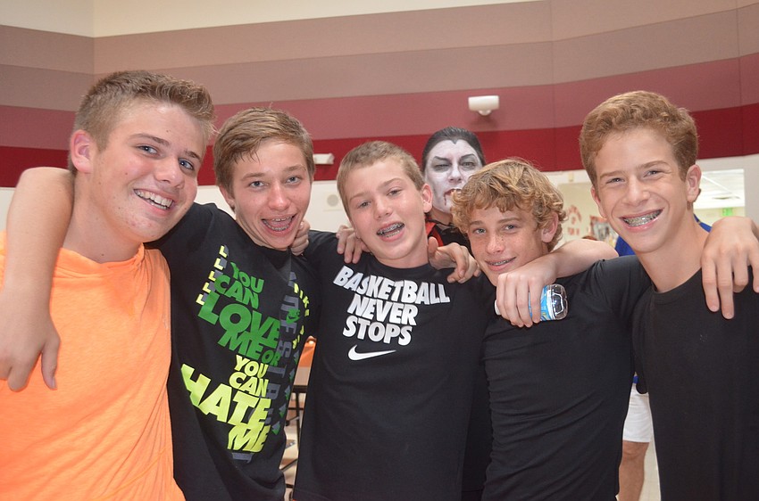 Ryan Shay, Doug Polk, Zach Delmedico, Ryan Blechta and Reed Windom smile with Dracula