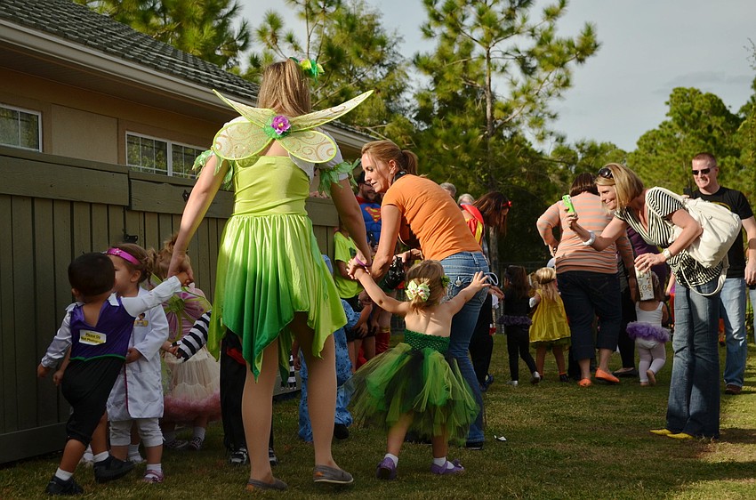 Teachers and students at Primrose School walk in the 9th annual Costume Parade.