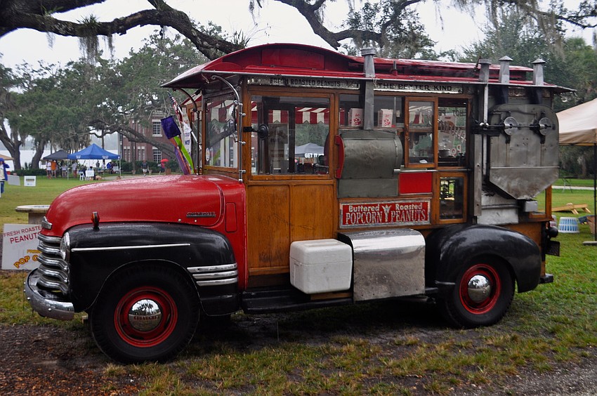 A popcorn and peanut truck greets guest near the entrance.