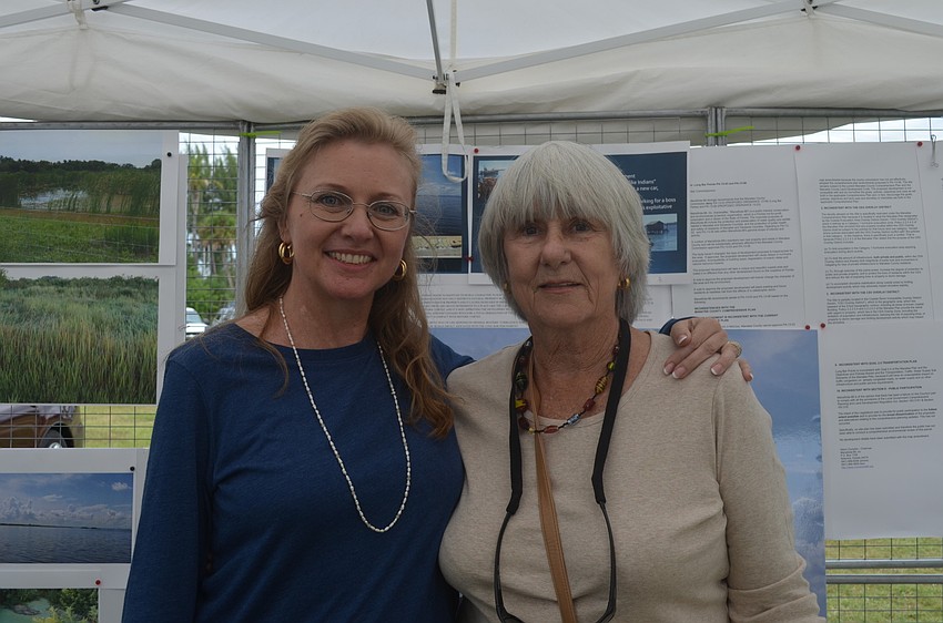 Susanna Young and Terri K. Wonder in front of their work to preserve the Bay