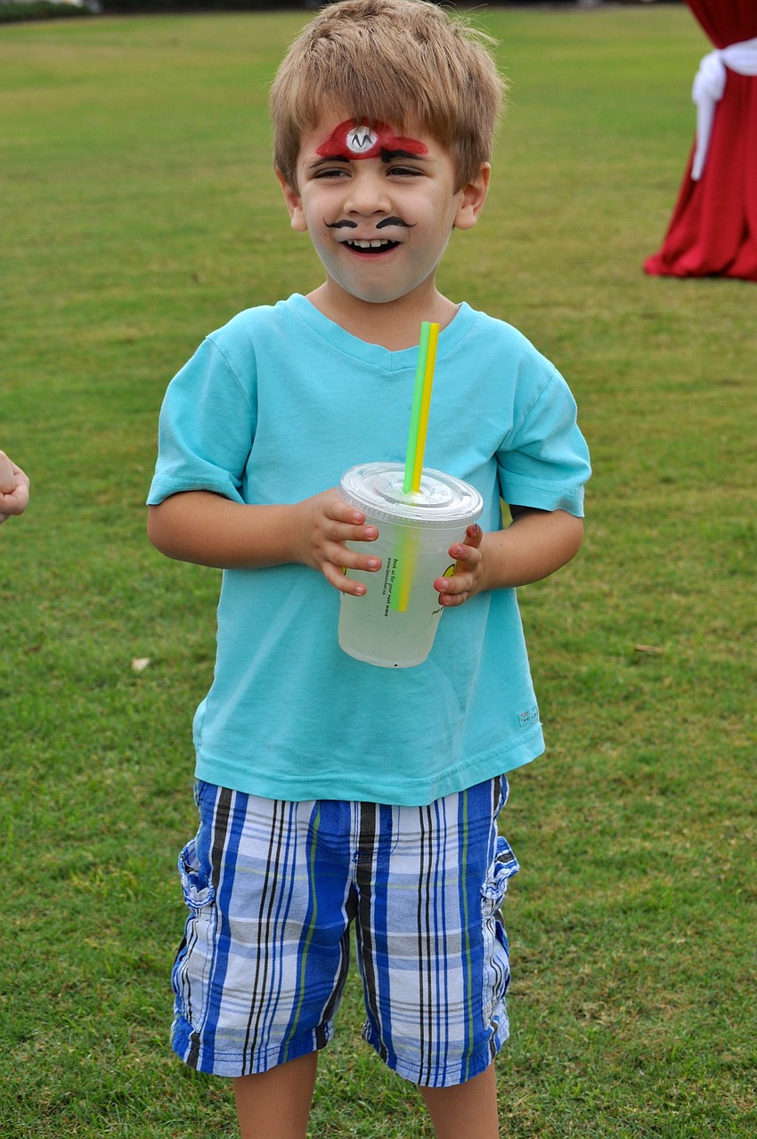 Aidin Krdzic, 3, sports Mario face paint.