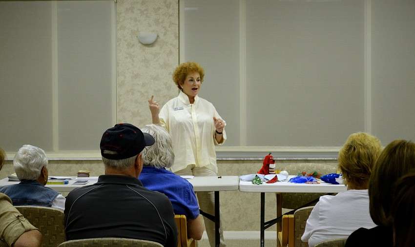 Marjorie Singer speaks to the Longboat Key Garden Club