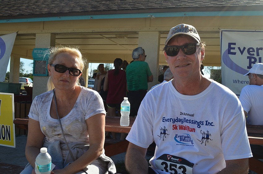Luba Khasik and Chuck Metras relax after the run