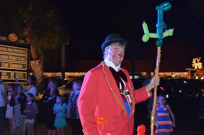 Scott Gregory led the parade as Sunshine the Clown.