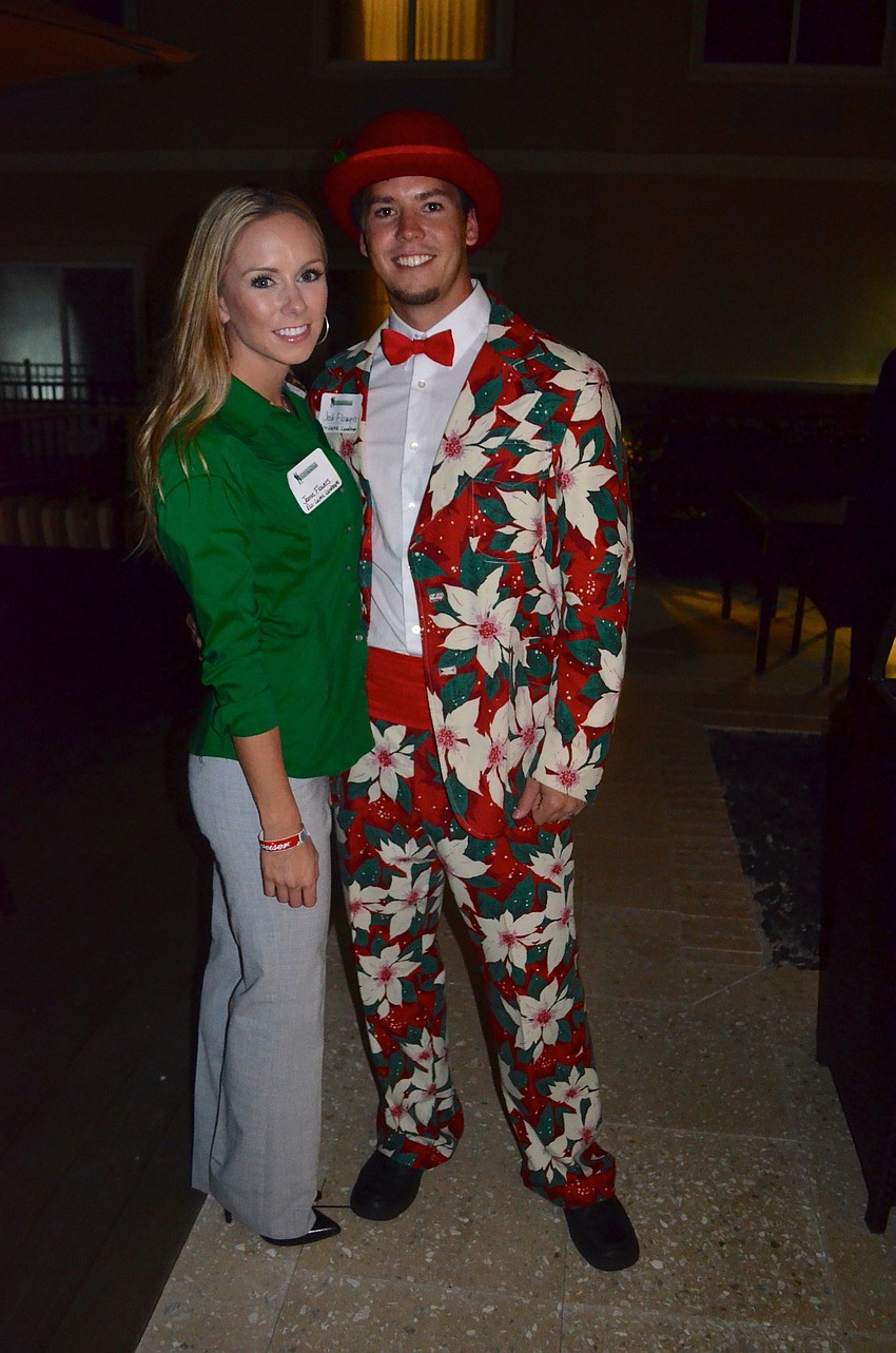 Jamie Flowers with her husband, Josh, who can't wait to show off his festive clothes.
