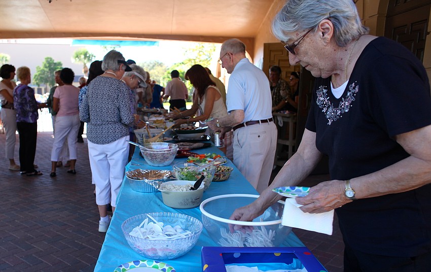 Many parishioners brought homemade sides and sweets to the picnic.