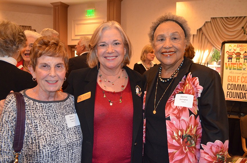 Embracing Our Differences' Steering Board member Nancy Roucher and School Board member Shirley Brown with artist Eleanor Darlington.