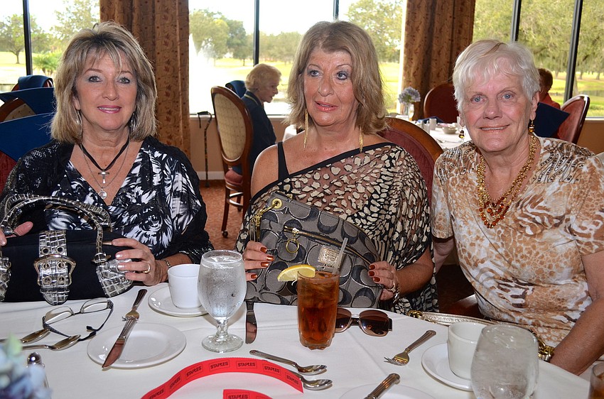 Lisa Duggar, Kathleen Allen and Carolyne Magda enjoy cold refreshments.