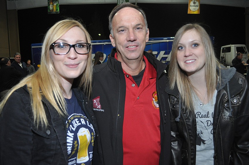 Patrisha Martin and Erin Brady with Richard Parcels of the Hernando DeSoto Historical Society, event organizer