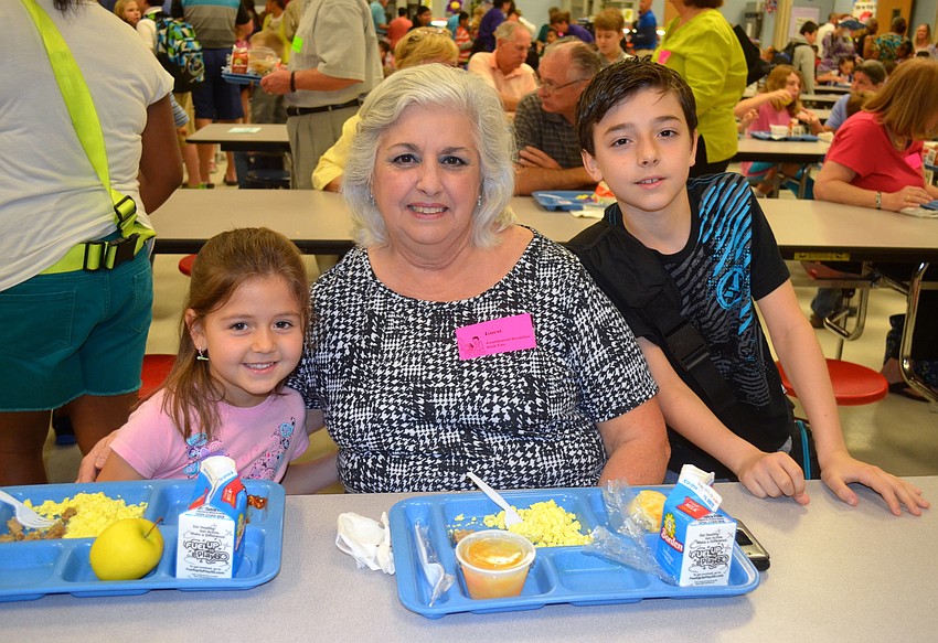 Gabriella Papageorgiou, 4, with her grandmother Susan Ayala, and  Konstantino Papageorgiou,10.
