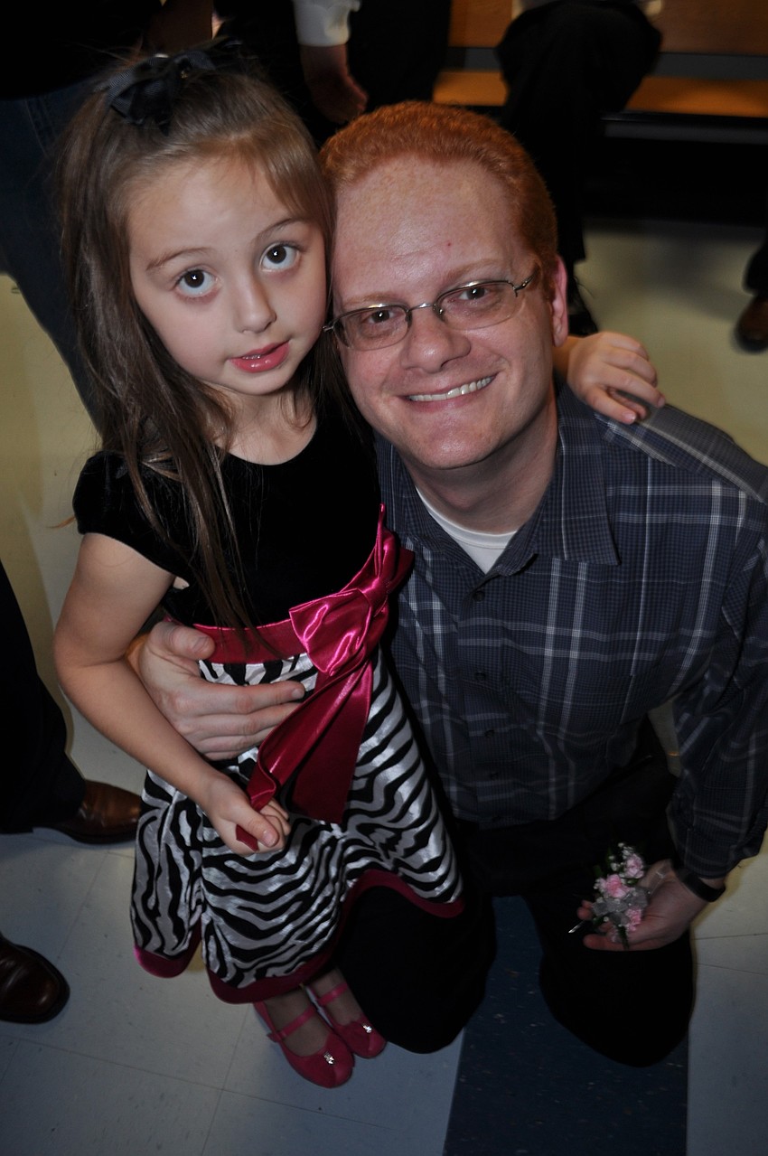 Madeline Thompson, 6, with her father, Matt