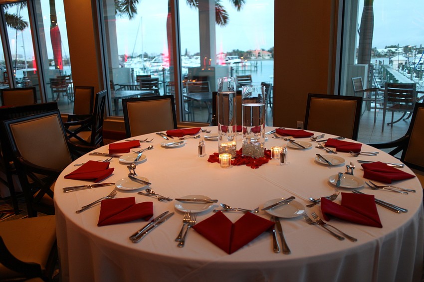 Each table was decorated with heart-shaped napkins and rose petals.