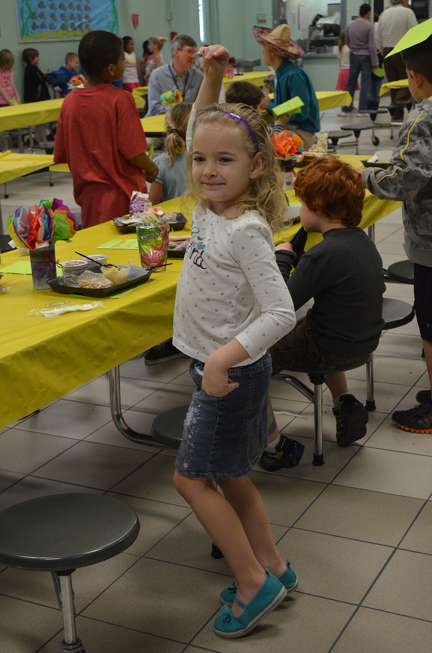 Mylee Haarer dances to Mexican music.