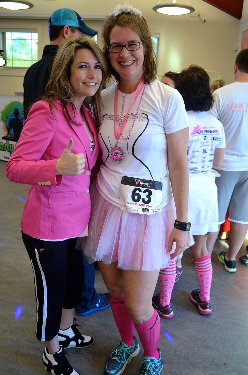 Maria Giacalone and Stephanie Lull show off their pink pride.