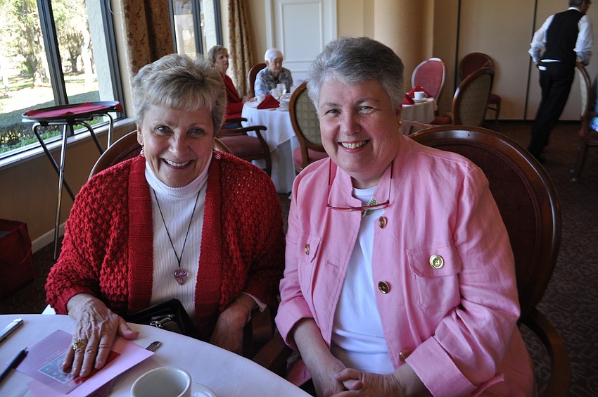 Mary Jo Steltmann and Mary Ellen Thinnis share a table.