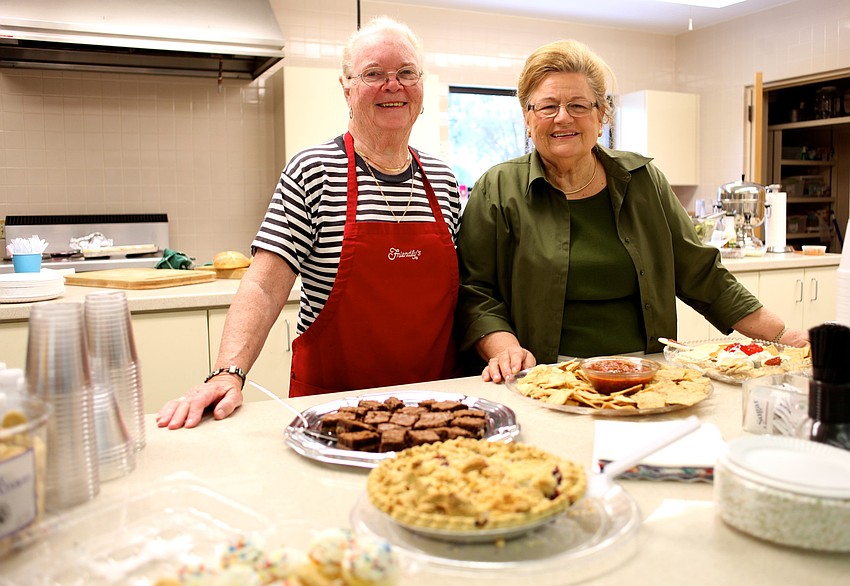 Mary Oâ€™Mahony and Andy Youngs prepare food for the hard workers.