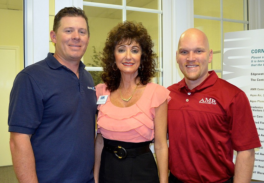 Jay Anderson, Edgewater Contractors, Victoria Jacobson, Executive Assistant of the Longboat Key Chamber of Commerce, and Josh Conn, AMR Contractors