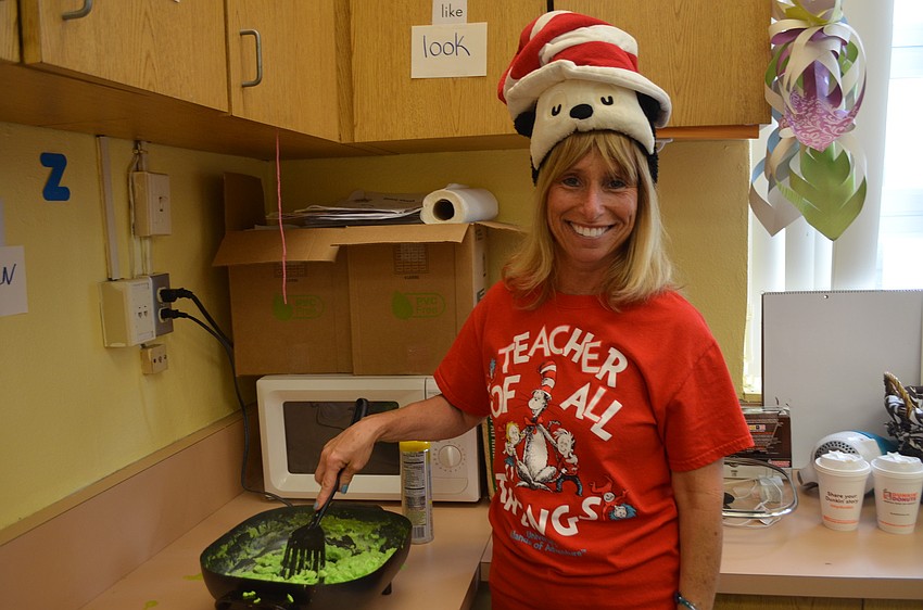 Felice Tannen makes a third batch of green eggs.