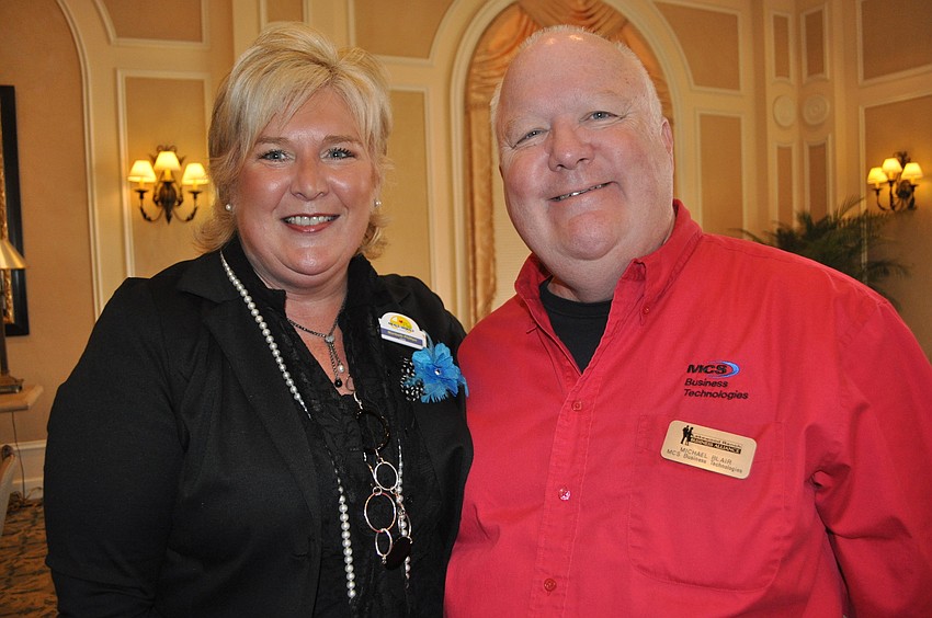 Maribeth Phillips of Meals on Wheels PLUS of Manatee with Mike Blair of MCS Business Technologies