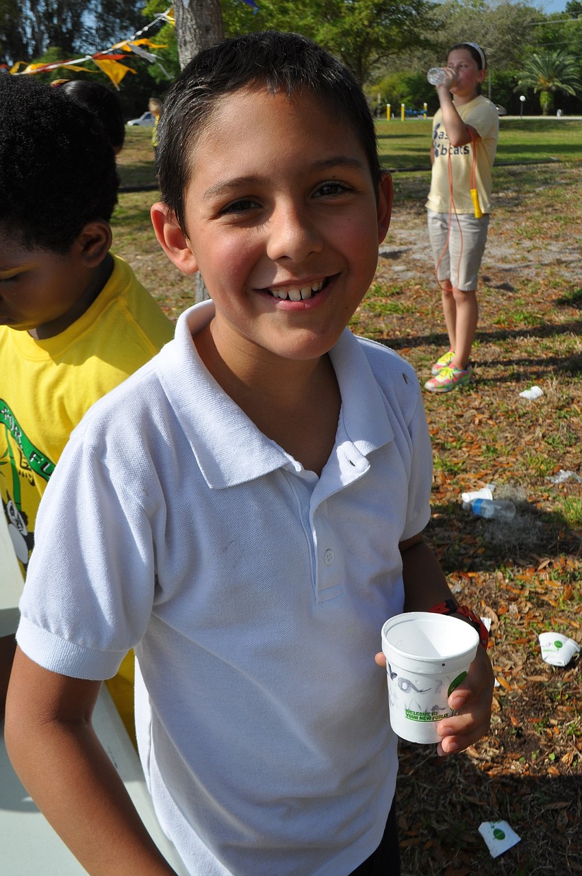 Evan Ferreto, 9, hydrates and relaxes.