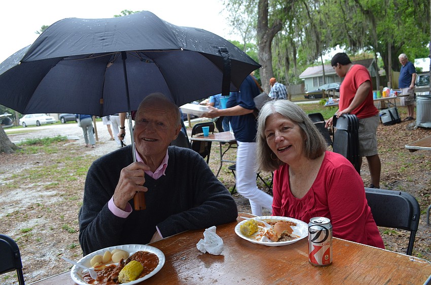 Graham and Barbara Ross stay dry.